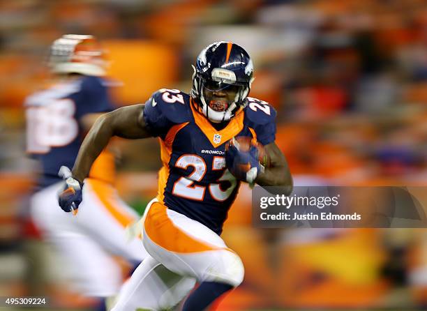 Ronnie Hillman of the Denber Broncos runs the ball against the Green Bay Packers in the fourth quarter at Sports Authority Field at Mile High on...