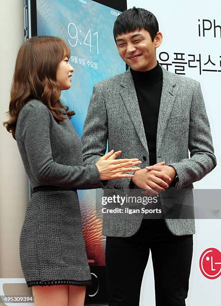 Park Bo-young and Yoo Ah-in attend the LG U+ iPhone 6s launching event at Gangnam on October 23, 2015 in Seoul, South Korea.