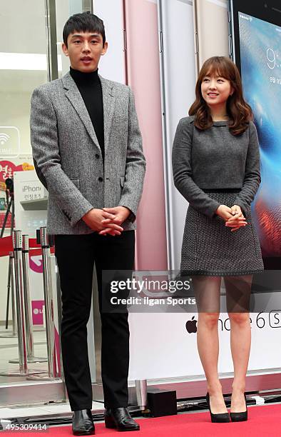 Yoo Ah-in and Park Bo-young attend the LG U+ iPhone 6s launching event at Gangnam on October 23, 2015 in Seoul, South Korea.