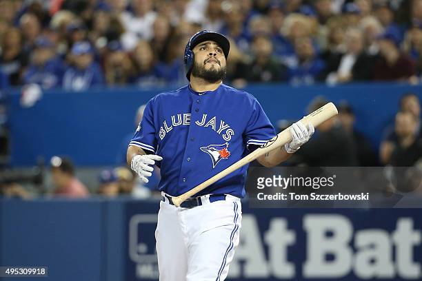 Dioner Navarro of the Toronto Blue Jays reacts after fouling off a pitch before drawing a walk in the second inning against the Kansas City Royals...