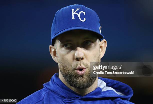 Alex Gordon of the Kansas City Royals warms up before the start of their game against the Toronto Blue Jays during game five of the American League...