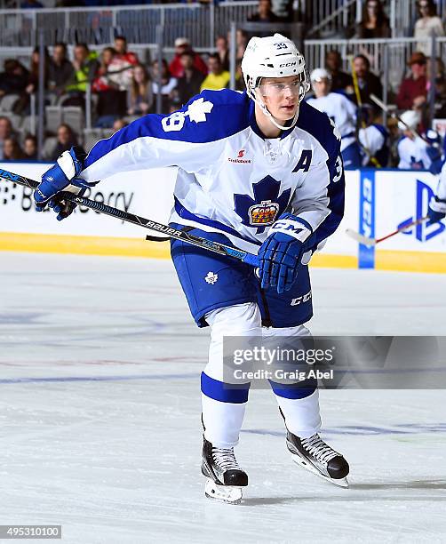 Matt Frattin of the Toronto Marlies skates up ice against the Grand Rapids Griffins during AHL game action on October 30, 2015 at Ricoh Coliseum in...