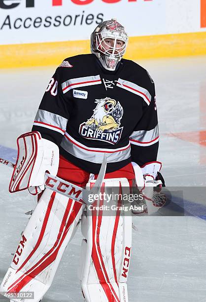 Tom McCollum of the Grand Rapids Griffins takes warmup prior to a game against the Toronto Marlies on October 30, 2015 at Ricoh Coliseum in Toronto,...