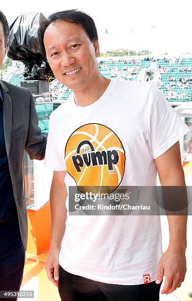 Former tennis player Michael Chang poses at France Television french chanels studio whyle the Roland Garros French Tennis Open 2014 - Day 9 on June...