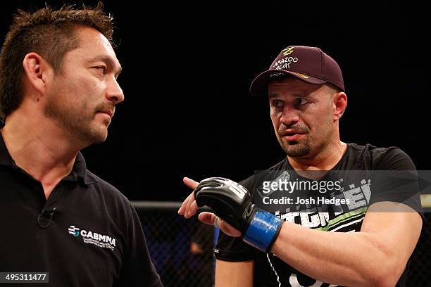 Fabio Maldonado protests to referee Mario Yamasaki after his knockout loss to Stipe Miocic in their heavyweight fight during the UFC Fight Night...
