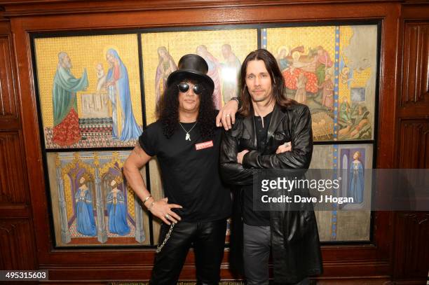 Myles Kennedy and Slash attend an album launch for Slash's new album 'World On Fire' at The Houses Of Parliament on June 2, 2014 in London, England.