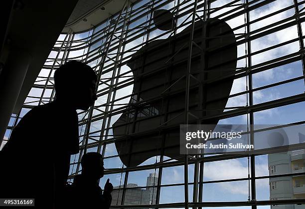 Attendees gather at the Apple Worldwide Developers Conference at the Moscone West center on June 2, 2014 in San Francisco, California. Apple CEO Tim...
