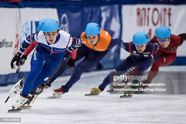 Dmitry Migunov of Russia stays ahead of the pack on Day 2 of the ISU World Cup Short Track Speed Skating competition at Maurice-Richard Arena on...