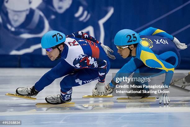 Vyacheslav Kurginyan of Russia competes against Nurbergen Zhumagaziyev of Kazakhstan on Day 2 of the ISU World Cup Short Track Speed Skating...