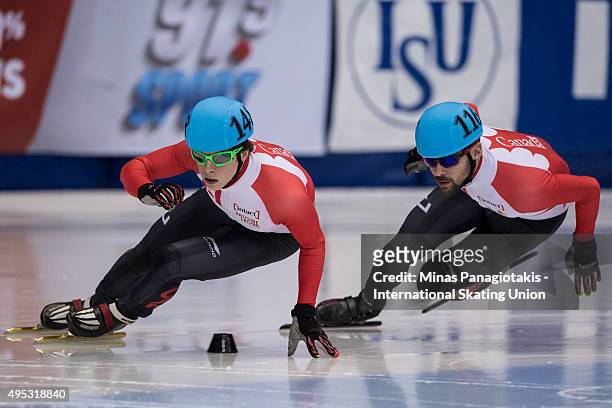 Charle Cournoyer of Canada competes against fellow countryman Francois Hamelin on Day 2 of the ISU World Cup Short Track Speed Skating competition at...