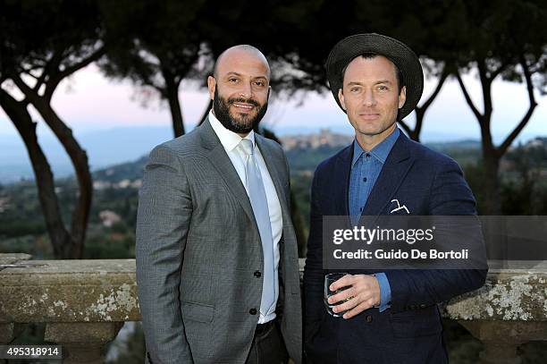 Jude Law and guest at the photocall of Johnnie Walker Blue Label's The Gentleman's Wager II at Villa Mondragone on October 31, 2015 in Rome, Italy.