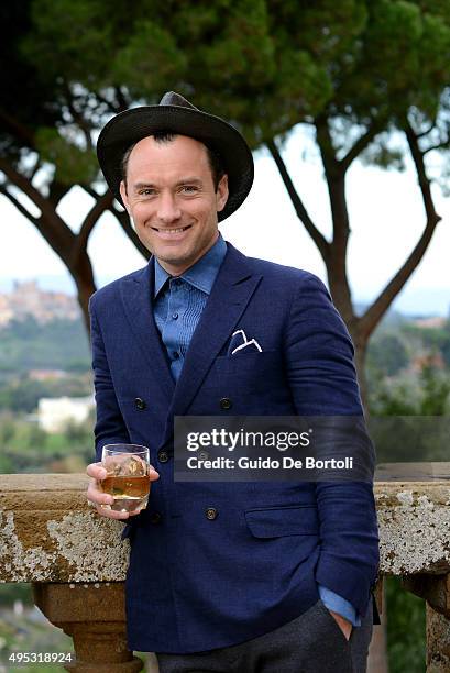 Jude Law toasts at the photocall of Johnnie Walker Blue Label's The Gentleman's Wager II at Villa Mondragone on October 31, 2015 in Rome, Italy.