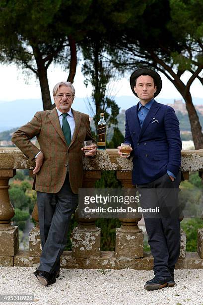 Jude Law and Giancarlo Giannini toast at the photocall of Johnnie Walker Blue Label's The Gentleman's Wager II at Villa Mondragone on October 31,...
