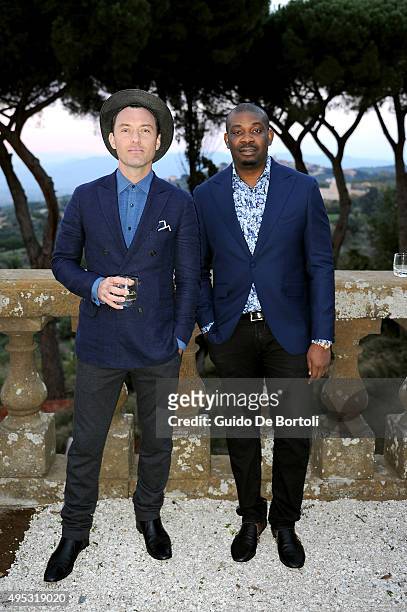 Jude Law and Don Jazzy toats at the photocall of Johnnie Walker Blue Label's The Gentleman's Wager II at Villa Mondragone on October 31, 2015 in...