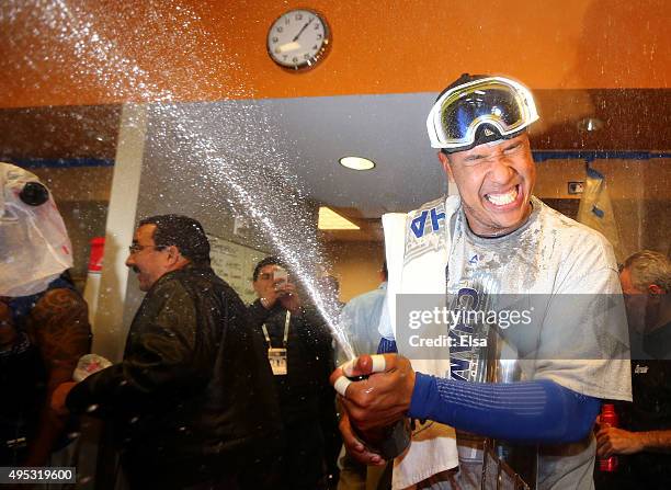 Salvador Perez of the Kansas City Royals celebrates in the clubhouse after defeating the New York Mets to win Game Five of the 2015 World Series at...