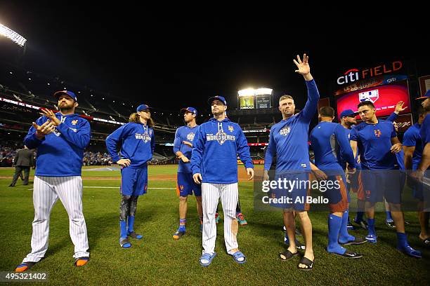 New York Mets players Jonathon Niese, Jacob deGrom, and David Wright wave to fans after Game Five of the 2015 World Series at Citi Field on November...