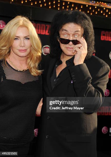 Musician/TV personality Gene Simmons and Shannon Tweed arrive at the Los Angeles premiere of 'Godzilla' at Dolby Theatre on May 8, 2014 in Hollywood,...