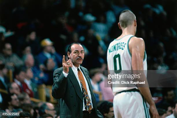 Head Coach Chris Ford speaks to Eric Montross of the Boston Celtics during a game played in 1995 at the Boston Garden in Boston, Massachusetts. NOTE...