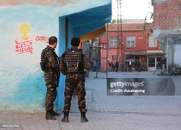 Army patrol the street near a Polling Station on November 1, 2015 in Diyarbakir, Turkey. Polls have opened in Turkey's second general election this...