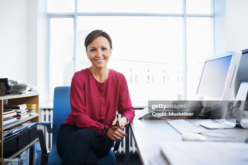 Businesswoman sitting at a desk