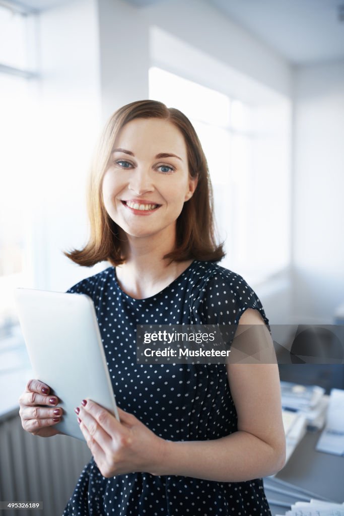 Portrait of a woman in office