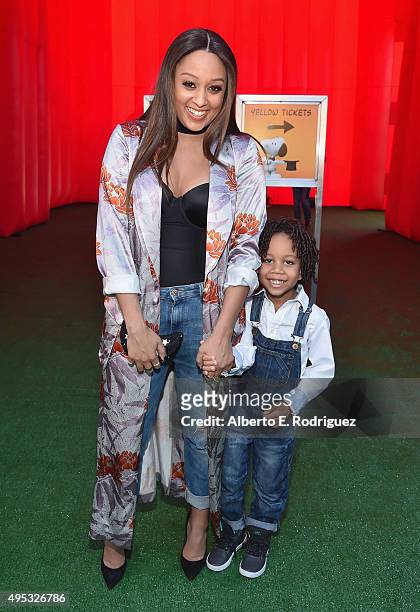 Actress Tia Mowry and son Cree Taylor Hardrict attend the premiere of 20th Century Fox's "The Peanuts Movie" at The Regency Village Theatre on...