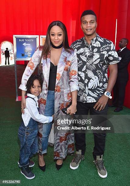 Actress Tia Mowry, Cory Hardrict and son Cree Taylor Hardrict attend the premiere of 20th Century Fox's "The Peanuts Movie" at The Regency Village...