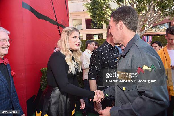 Singer Meghan Trainor and Ralph Millero, Vice President of Fox Animation attend the premiere of 20th Century Fox's "The Peanuts Movie" at The Regency...