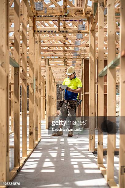 worker checking construction site - constructs stock pictures, royalty-free photos & images