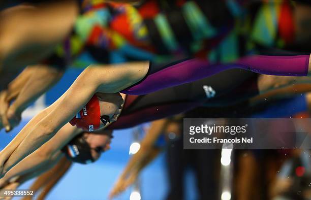 Swimmers competes in the Women's 50m Freestyle heats during day one of the FINA World Swimming Cup 2015 at the Hamad Aquatic Centre on November 2,...