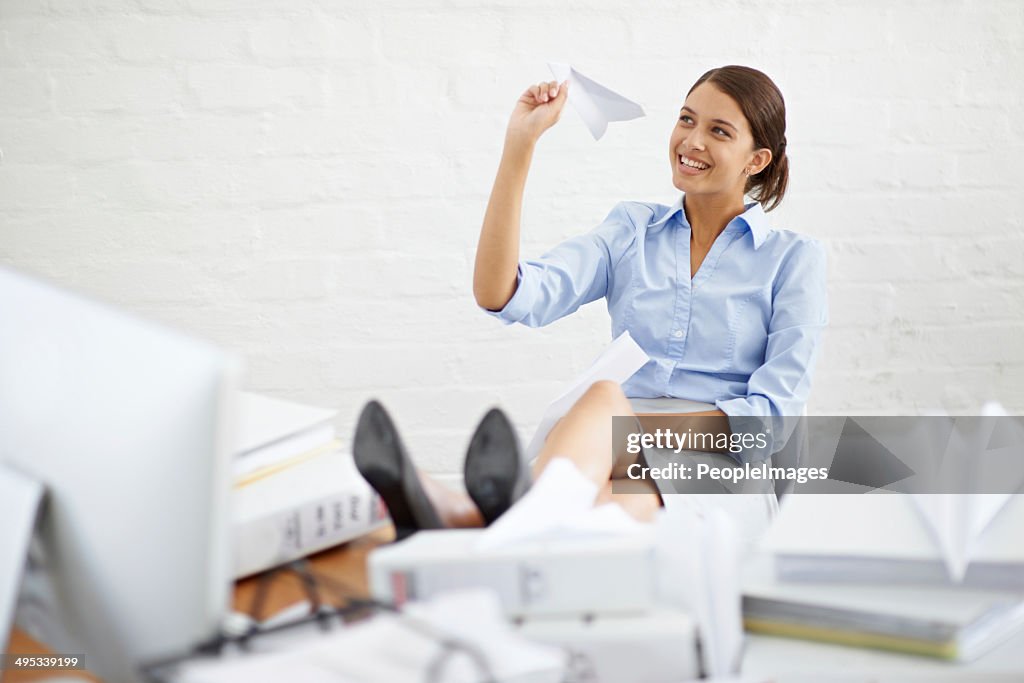 Slightly distracted at her desk