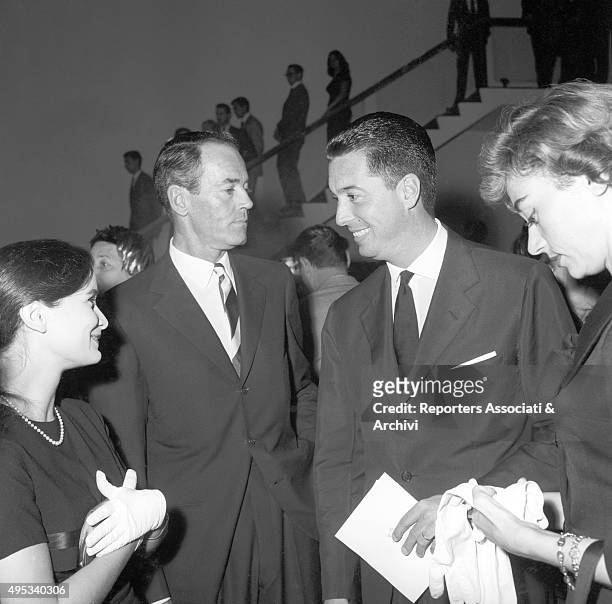 American actor Henry Fonda and his wife and Italian baroness Afdera Franchetti attending an opening night at Eliseo theatre in Rome with Rudy Crespi....
