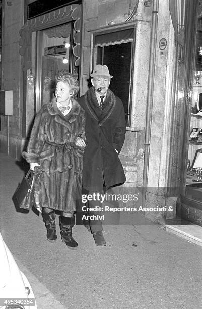 British actor John Mills and his wife walking in the streets of Rome. Rome, 1966