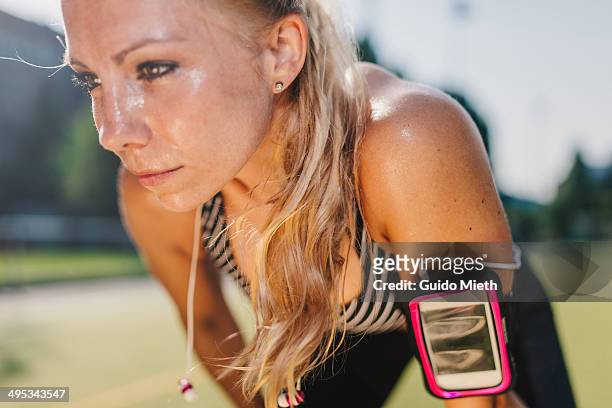 woman after workout. - sport determination stock-fotos und bilder