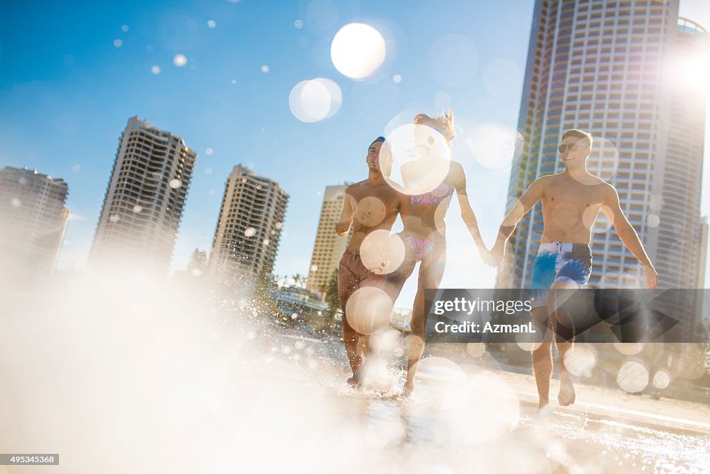 Friends Running into the Sea