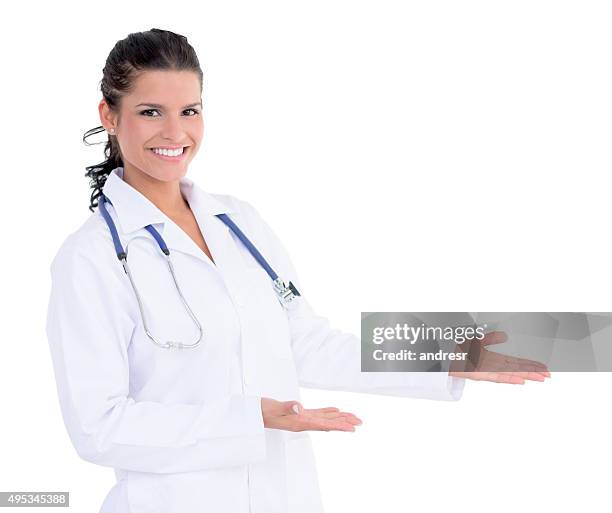 welcoming doctor - doctor coat stock pictures, royalty-free photos & images