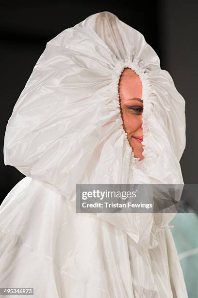 Model walks the runway wearing designs by Phoebe Kowalska during the Kingston University show during day 3 of Graduate Fashion Week 2014 at The Old...