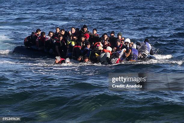 Refugees hoping to cross into Europe, arrive on the shore of Lesbos Island, Greece on November 02, 2015.