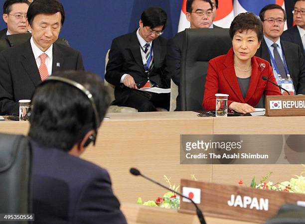 South Korean President Park Geun-hye addresses during the trilateral summit between Japan, South Korea and China at the presidential Blue House on...