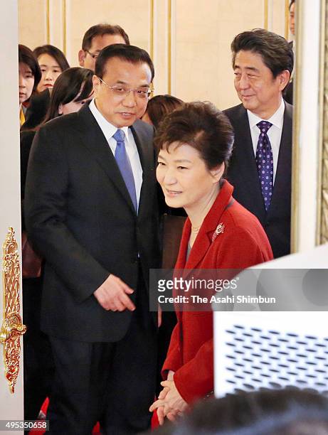 Japanese Prime Minister Shinzo Abe , South Korean President Park Geun-hye and Chinese Premier Li Keqiang attend the trilateral summit between Japan,...