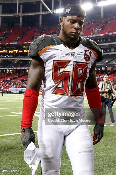 Linebacker Kwon Alexander of the Tampa Bay Buccaneers shows emotion as he walks off the field after the game against the Atlanta Falcons at the...