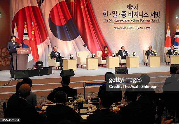 President Park Geun-hye, Japanese Prime Minister Shinzo Abe and Chinese Premier Li Keqiang attend a business summit on the sidelines of the...