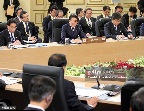 Japanese Prime Minister Shinzo Abe attends the trilateral summit between Japan, South Korea and China at the presidential Blue House on November 1,...