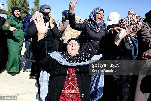 People mourn for the 23-years-old Palestinian Muhammad Shemasina, killed by Israeli soldiers on October, during his funeral ceremony in Jerusalem, on...