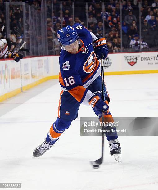 Steve Bernier of the New York Islanders takes the shot against the Buffalo Sabres at the Barclays Center on November 1, 2015 in the Brooklyn borough...