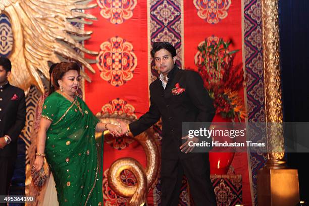Congress leader Jyotiraditya Madhavrao Scindia with his mother Madhavi Raje Scindia during the wedding reception of MP and Congress spokesperson...