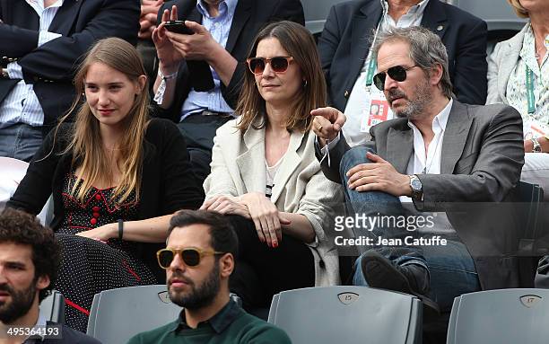 Deborah Francois, Geraldine Pailhas and husband Christopher Thompson watch Gael Monfils' match on Day 9 of the French Open 2014 held at Roland-Garros...