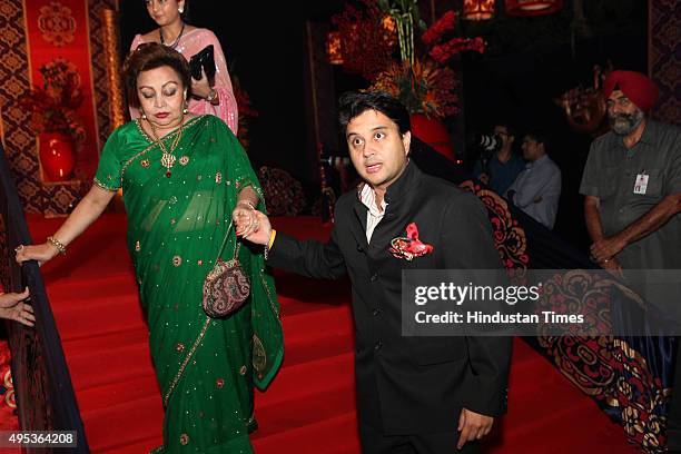 Congress leader Jyotiraditya Madhavrao Scindia with his mother Madhavi Raje Scindia during the wedding reception of MP and Congress spokesperson...