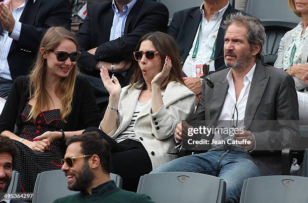 Deborah Francois, Geraldine Pailhas and husband Christopher Thompson watch Gael Monfils' match on Day 9 of the French Open 2014 held at Roland-Garros...