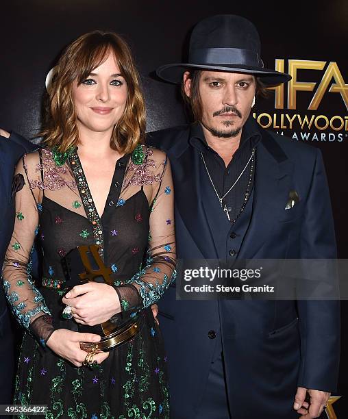 Johnny Depp and Dakota Johnson poses at the 19th Annual Hollywood Film Awardsat The Beverly Hilton Hotel on November 1, 2015 in Beverly Hills,...